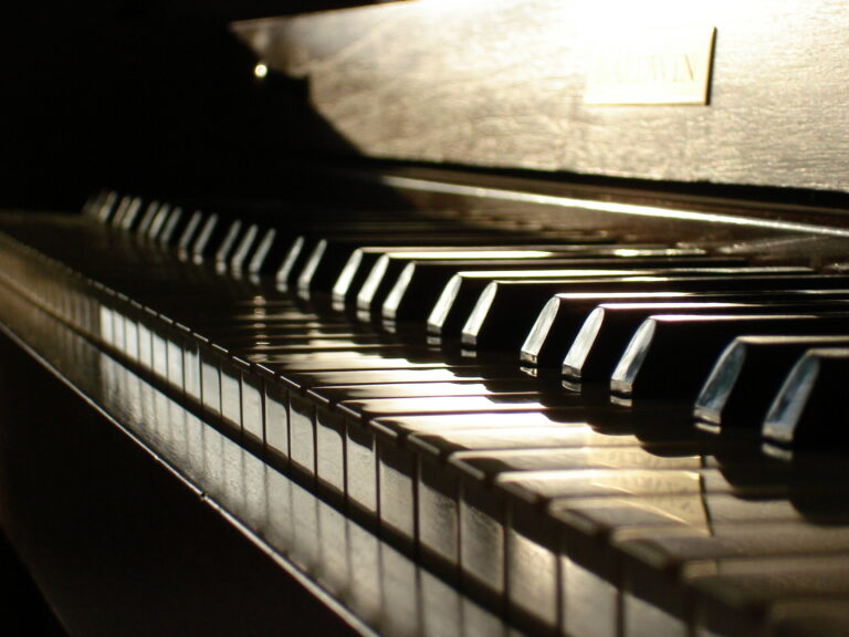 old piano keys in shadow and light